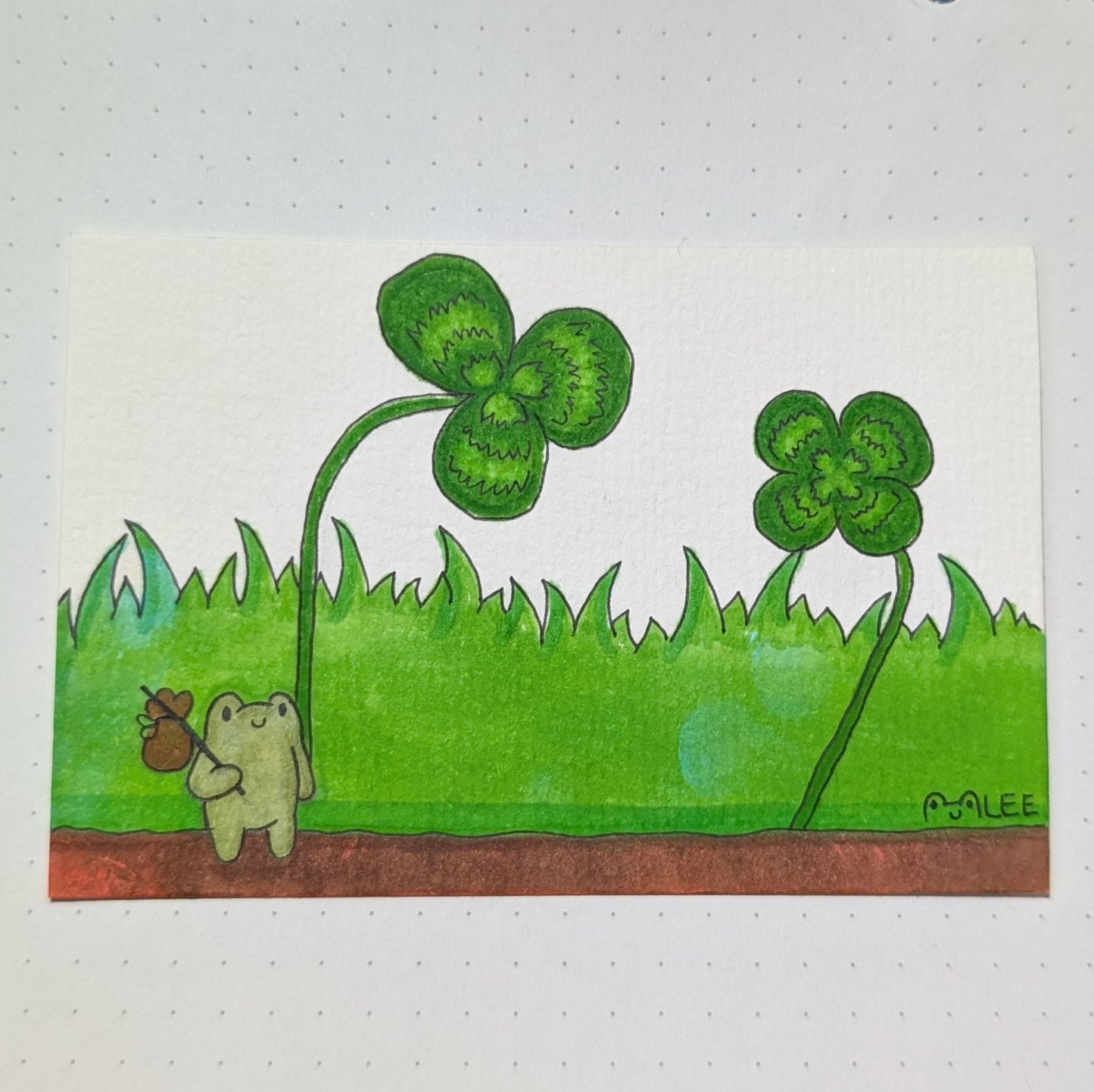 "Frosch im Gras"